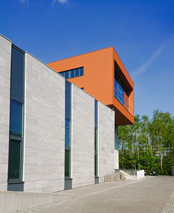 Exterior of modern building against clear blue sky