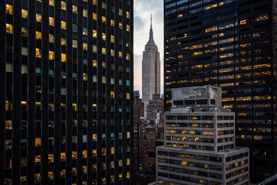 View of skyscrapers lit up at night