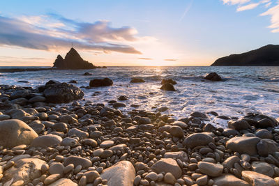 Scenic view of sea against sky during sunset