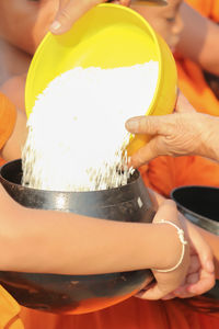 Close-up of man preparing food