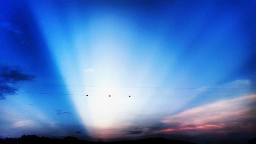 Low angle view of vapor trails in sky