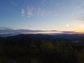 Scenic view of landscape against sky during sunset