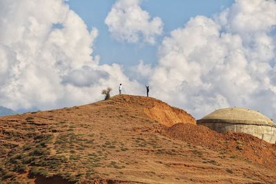 Low angle view of land against sky