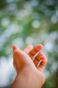 Cropped hand of woman holding hands