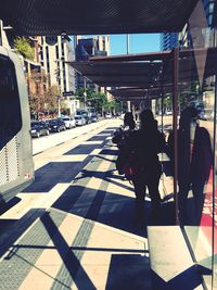 People walking on city street