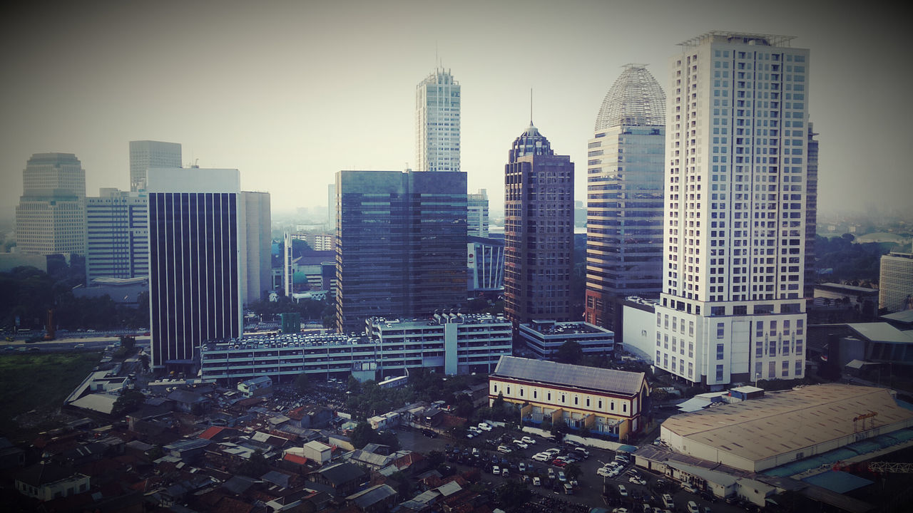 building exterior, architecture, city, built structure, skyscraper, cityscape, tall - high, tower, office building, modern, crowded, sky, high angle view, clear sky, tall, building, city life, residential building, urban skyline, auto post production filter