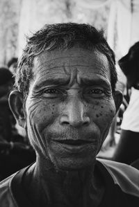 Close-up portrait of man wearing mask