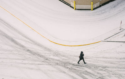 Man on snow covered landscape