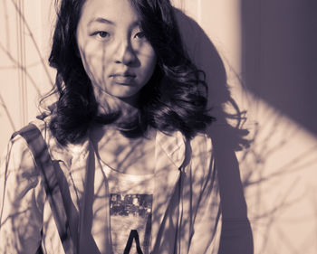 Portrait of beautiful woman at home