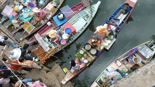 High angle view of people at street market