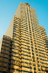 Low angle view of modern building against clear sky