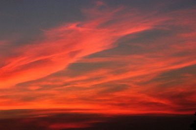 Low angle view of dramatic sky during sunset