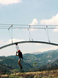 Hanging on the zipline