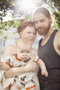 Young parents with baby