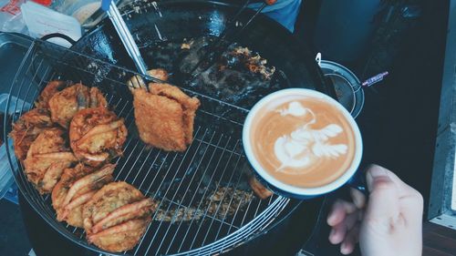 Close-up of hand holding food