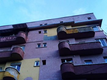 Low angle view of building against blue sky