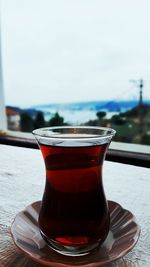 Close-up of coffee cup on table