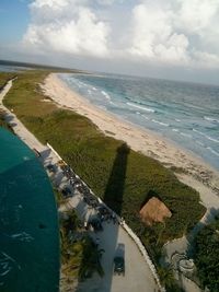 Scenic view of sea against cloudy sky