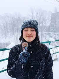 Portrait of a girl in snow