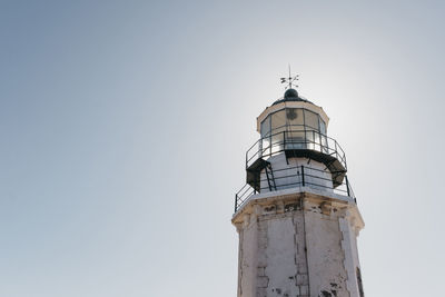 Armenistis lighthouse against the sky in mykonos, greece.