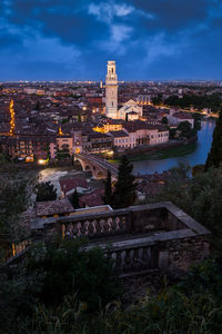 High angle view of illuminated buildings against sky