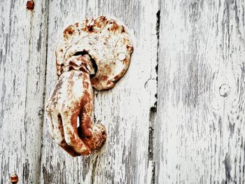 Close-up of door on wood