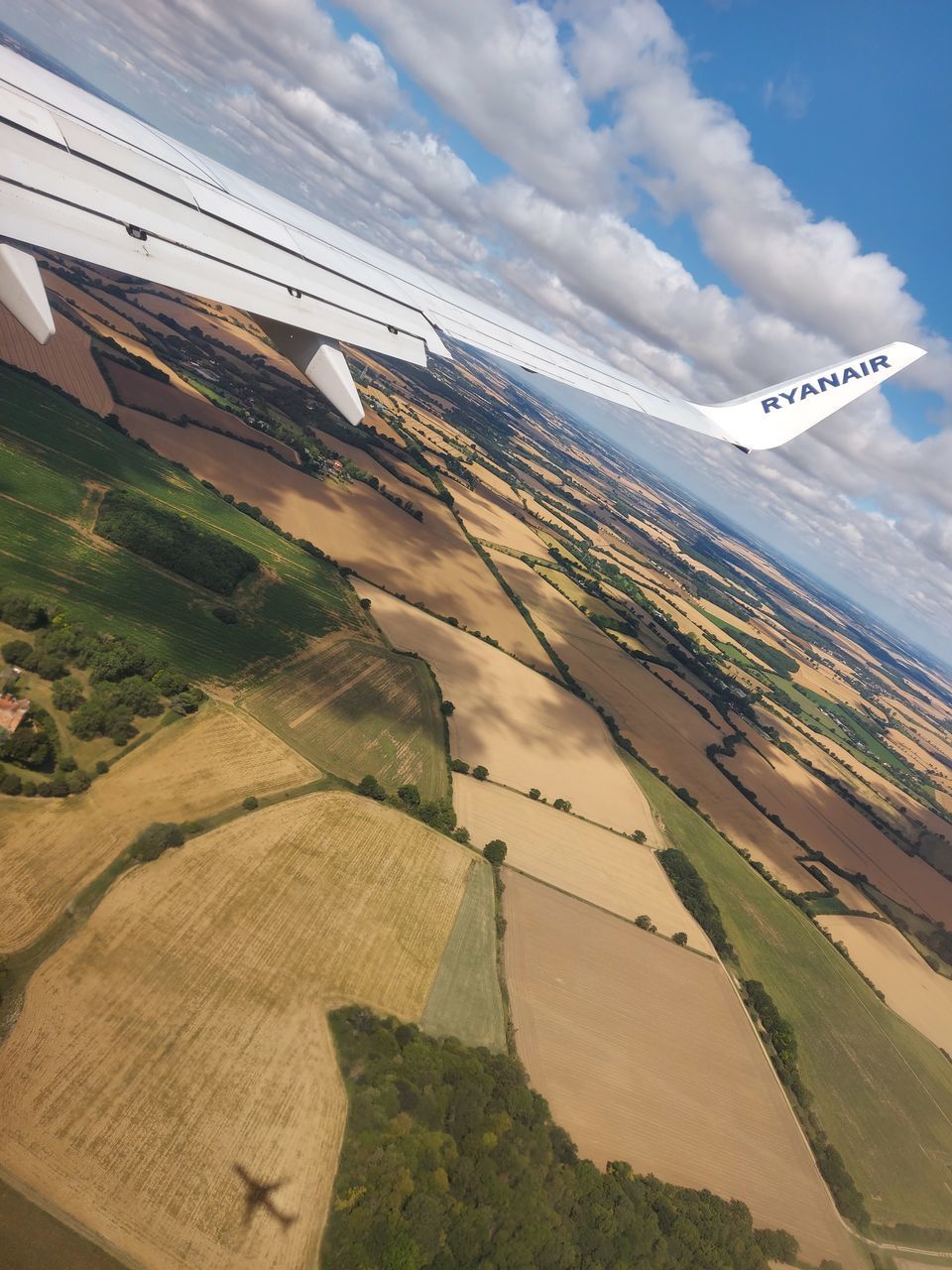 AERIAL VIEW OF LANDSCAPE AND AIRPLANE