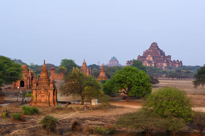 View of temple on building against clear sky