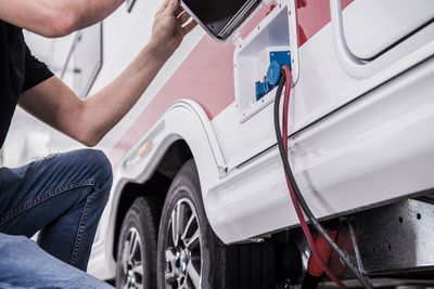 Man working in car