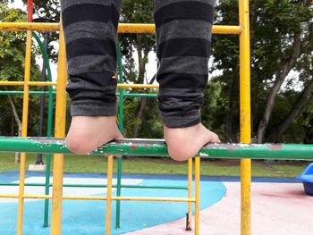 Low section of man playing in playground