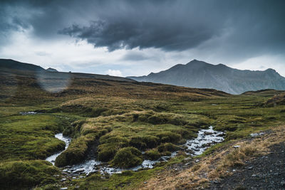 Scenic view of stream against sky