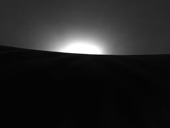Low angle view of moon against sky at night