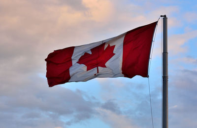 Low angle view of flag against sky