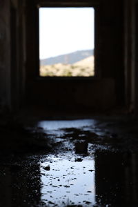 Wet window in abandoned building