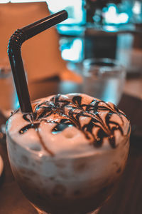 Close-up of ice cream in glass on table
