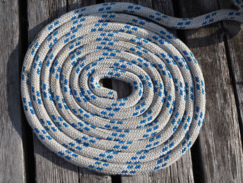 High angle view of rope on blue table