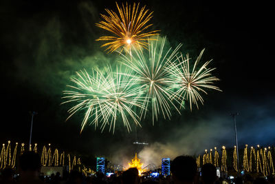 Low angle view of sky illumed with fire crackers