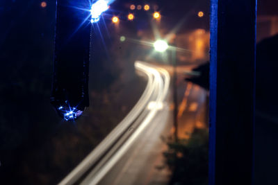 Light trails on road at night