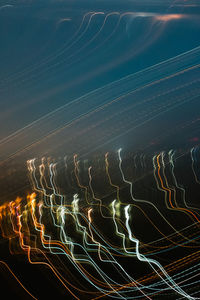 High angle view of light trails at night