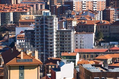 High angle view of residential buildings in city