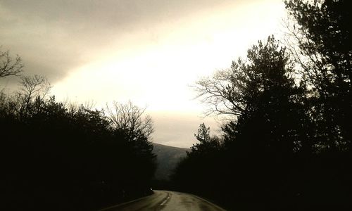 Scenic view of landscape against sky at sunset