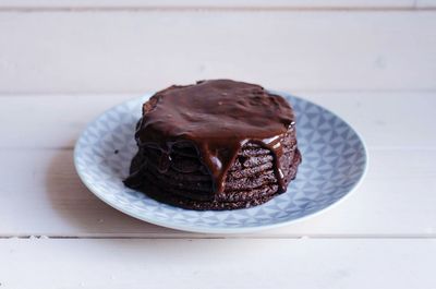 Close-up of chocolate cake in plate on table