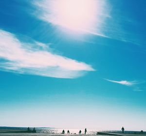 Scenic view of sea against blue sky
