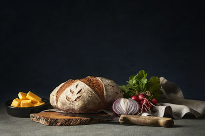 Beautiful sourdough bread with fresh vegetables and butter