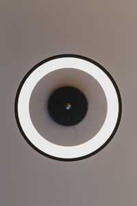 Directly below shot of electric lamp against ceiling