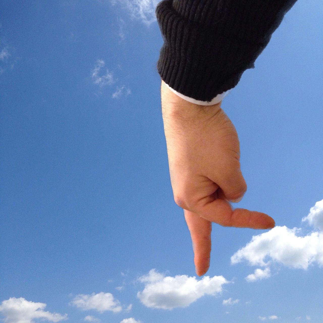 sky, blue, low angle view, cloud - sky, cloud, lifestyles, leisure activity, day, sunlight, outdoors, standing, person, part of, nature, low section, rear view, childhood