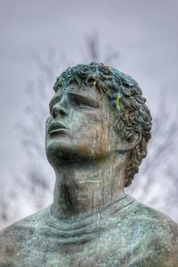 Close-up of statue against sky