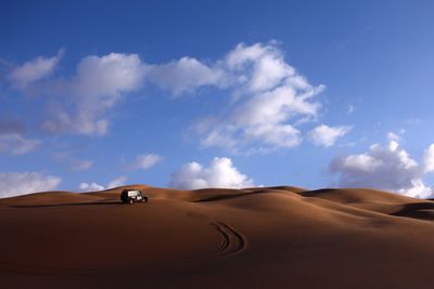 Scenic view of desert against sky