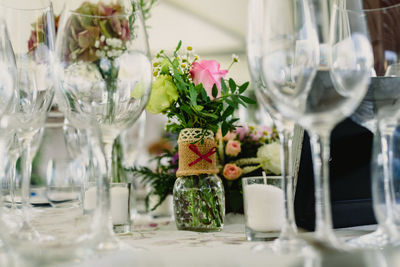 Flowers in glass on table