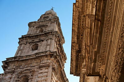 Low angle view of a temple building against clear sky